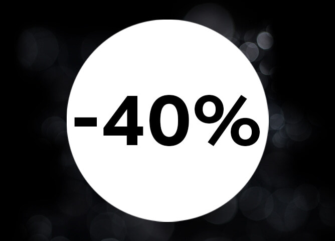 Hvit sirkel med teksten «-40%» på svart bakgrunn med diffuse lysglimt
