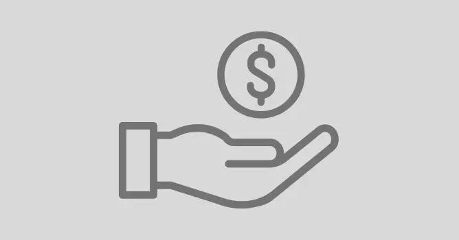 Hånd som holder en mynt med dollartegn