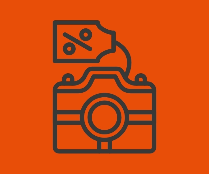 Kameraikon med prismetikett som viser prosenttegn