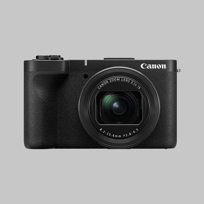 Kompakt Canon kamera med svart design og fremtredende zoomlinse Kompakt Canon kamera med svart design og fremtredende zoomlinse