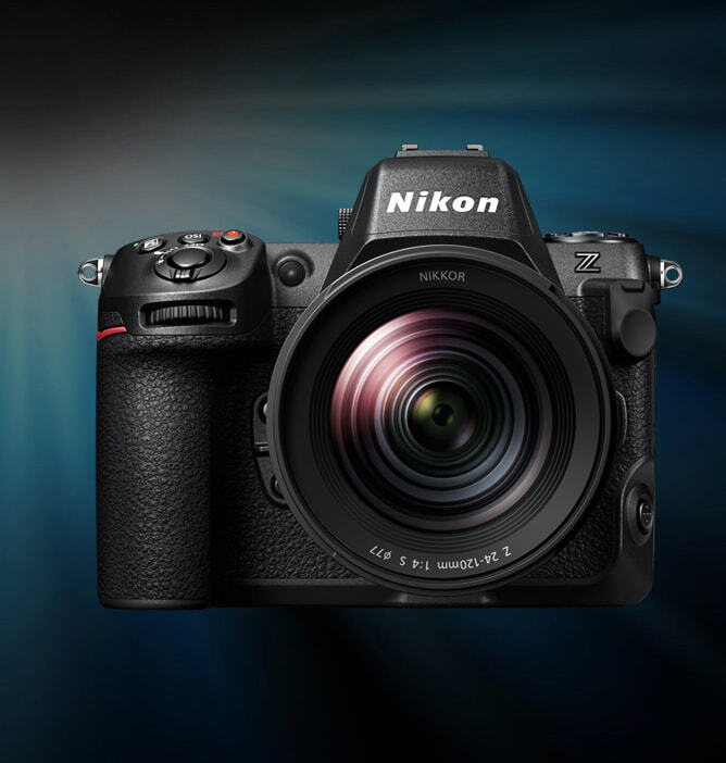 Speilreflekskamera Nikon Z med NIKKOR-objektiv, sett forfra med skarp fokus på linse