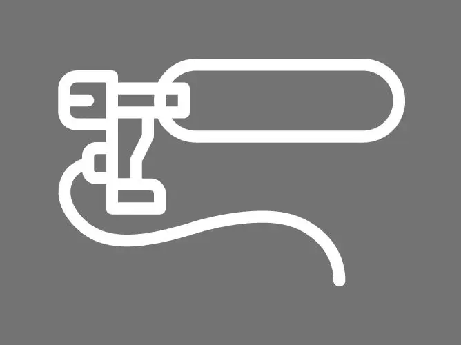 En illustrasjon av en mikrofon med en avrundet kropp og en kabel festet til basen